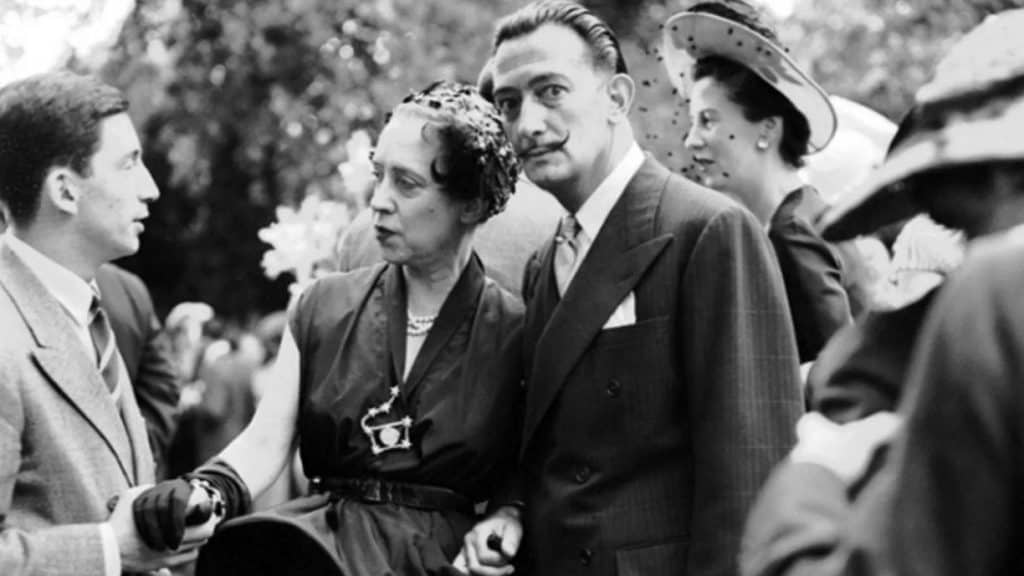 Elsa Schiaparelli and Salvador Dalì at Chez Lopez in Neuilly, France, 1950.