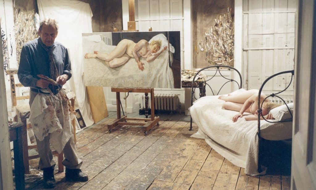 Lucian Freud in his studio with model Ria Kirby (2007)