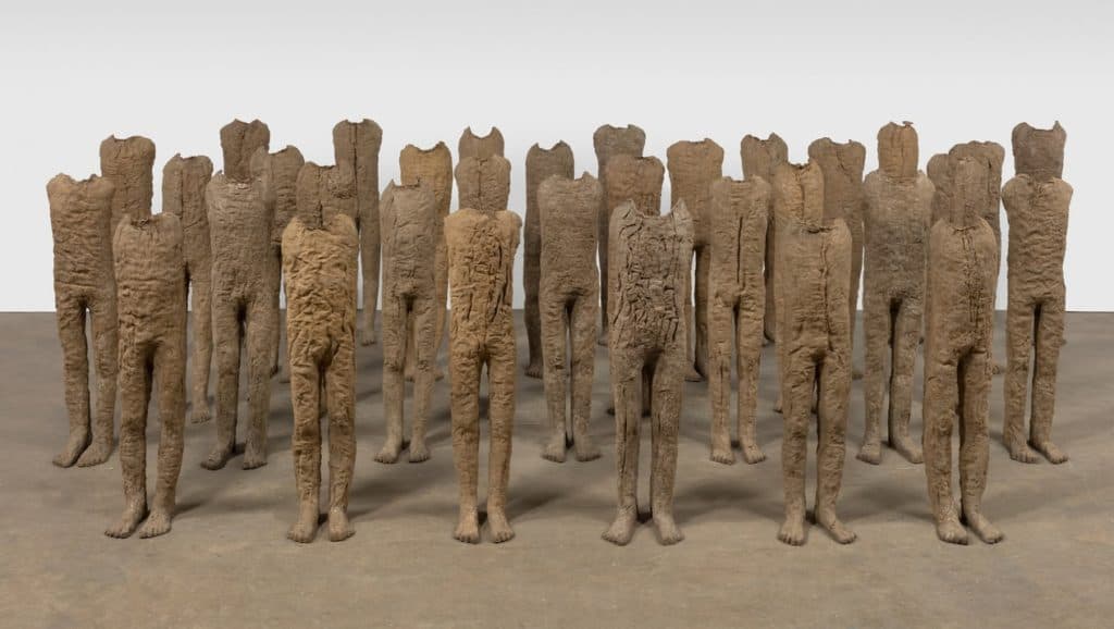 Magdalena Abakanowicz - Infants- 1992. 33 ethereal figures made of burlap and resin.