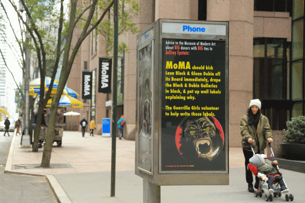 Guerrilla Girls poster calling on the Museum of Modern Art to cut ties with donors linked to Jeffrey EpsteinPhoto by Luna Park, courtesy of Art in Ad Places