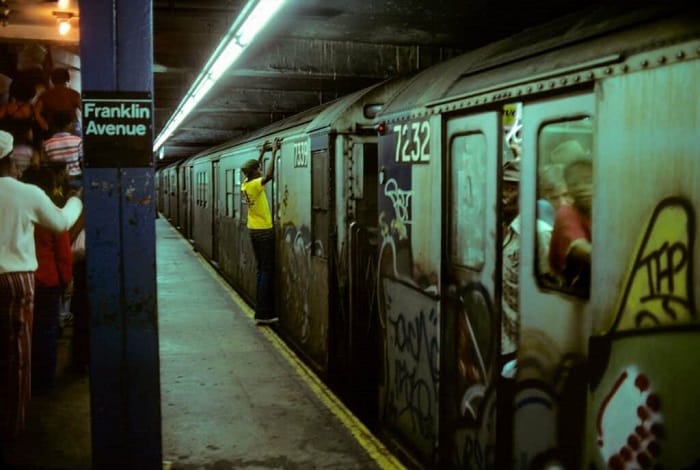 A subway car covered in graffiti and street art at Franklin Street Station, New York, 1978. 