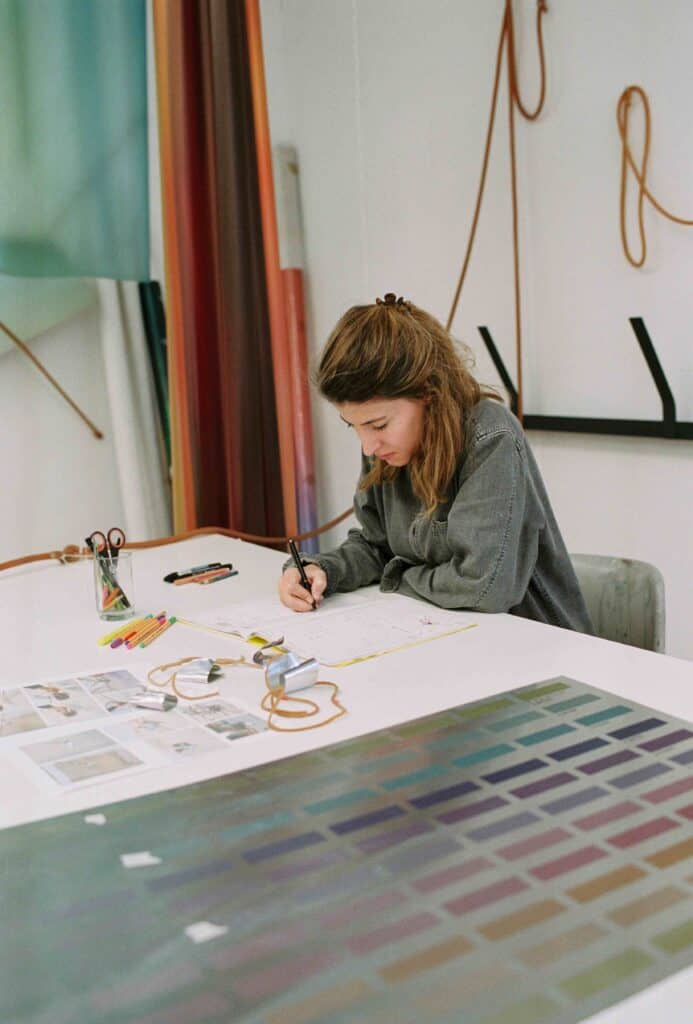 Inma Femenia working in her studio
